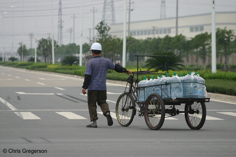 Photo of Man Transporting Bottled Water(3269)