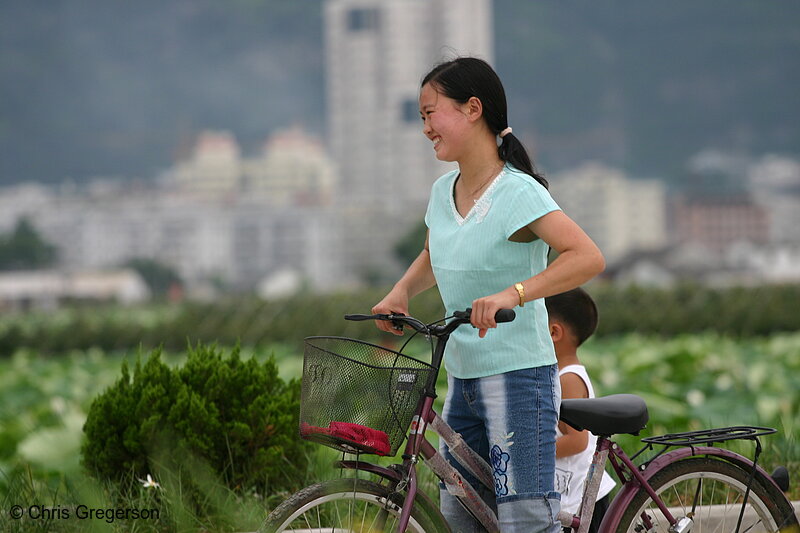 Photo of Girl on Bike Smiling(3447)
