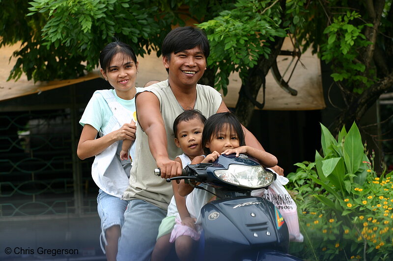Photo of Family on a Moped(4174)