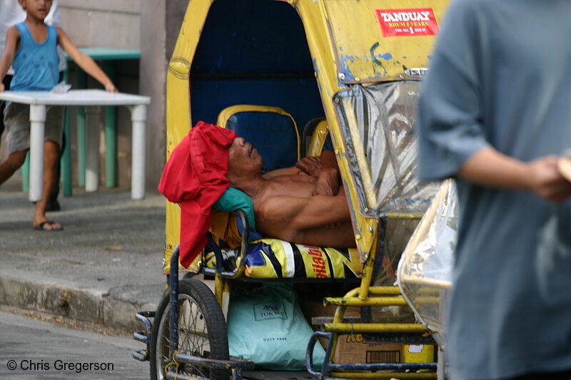Photo of Filipino Man Sleeping in a Sidecar(4454)