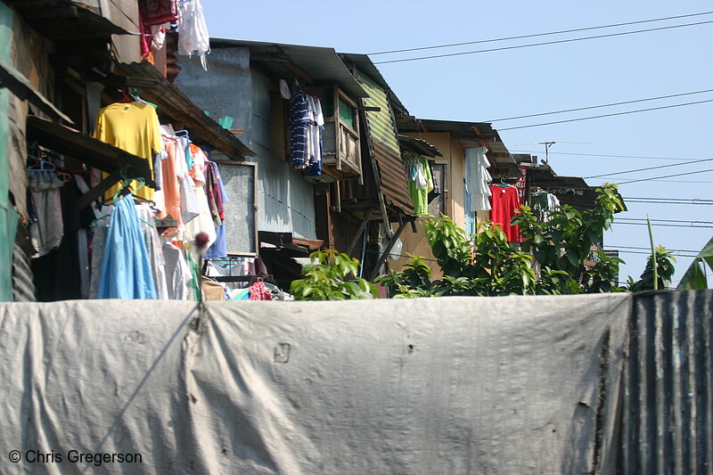 Photo of Row of Shanties with Colored Laundry(4583)