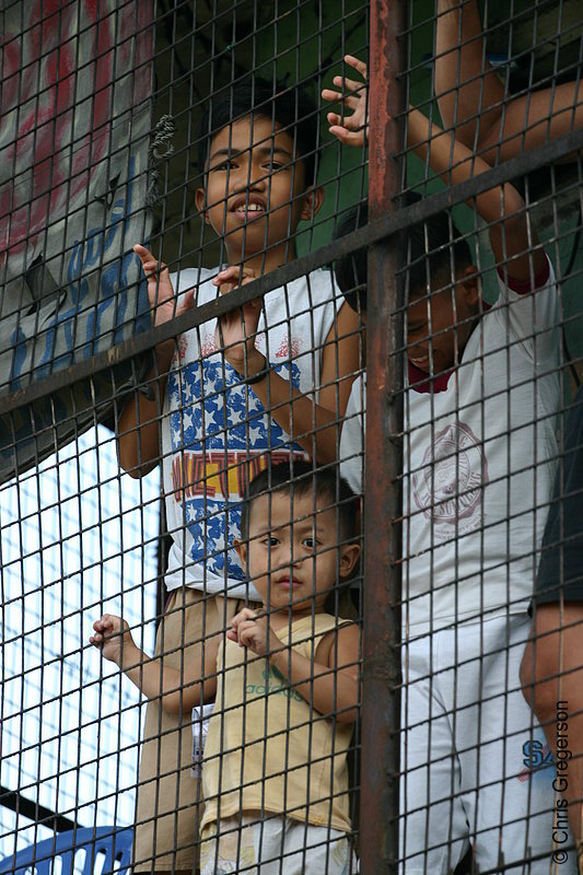 Photo of Boys Behind Wire Cage, Manila(4598)