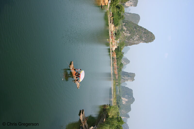 Photo of Karst Mountains and Couple on River Raft(4625)