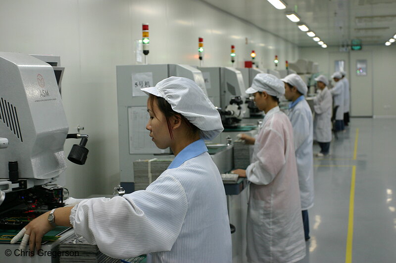 Photo of Row of Electronics Quality Control Inspectors(4905)