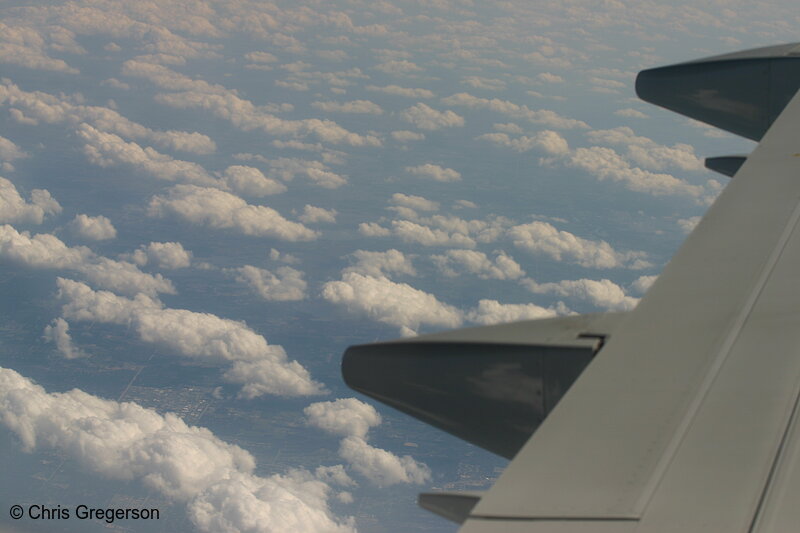 Photo of Rolling Clouds and Aircraft Wing(4985)
