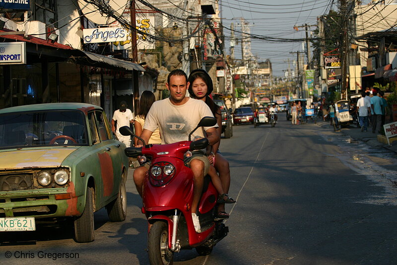 Photo of Man and Woman on Scooter, Fields Avenue, Angeles City(5002)