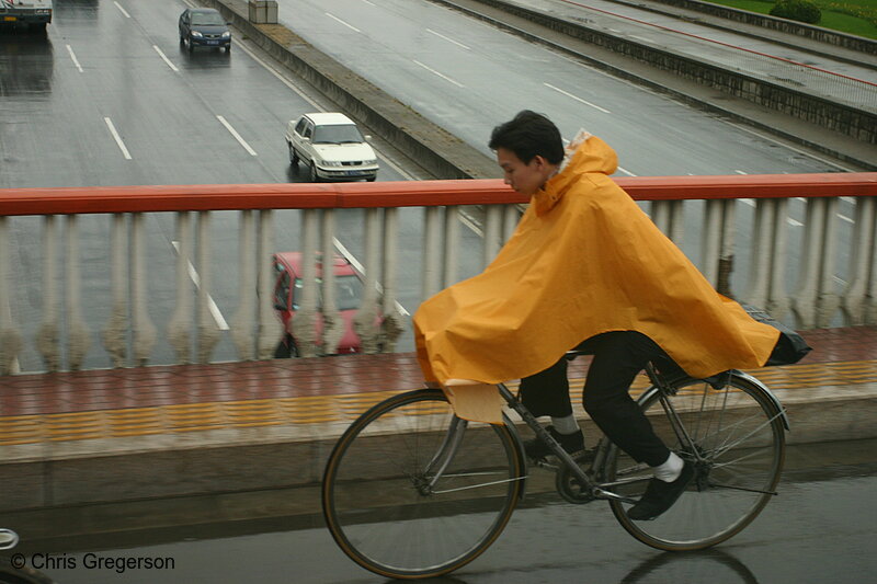 Photo of Man Biking in the Rain, Beijing, China(5083)