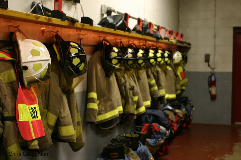 Photo of Helmets, coats, and boots inside fire station in New Richmond, Wisconsin, USA(5817)