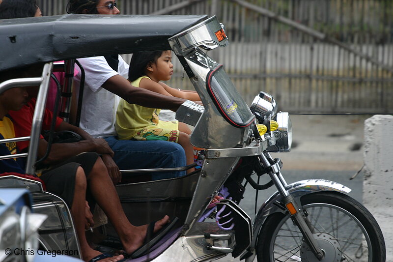 Photo of Young Girl Riding on Tricycle's Gas Tank(5832)