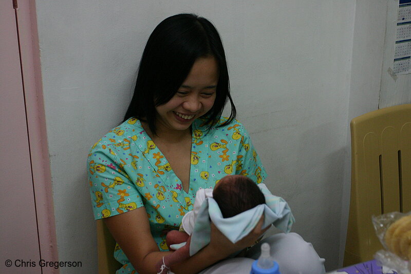 Photo of Nurse Taking Care of Infant in Ospital ng Angeles' (ONA) Nursery(5953)