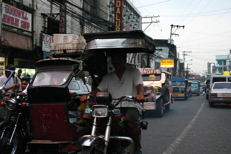 Photo of Tricycle followed by Jeepneys Travelling in Angeles City, Pampanga(5969)
