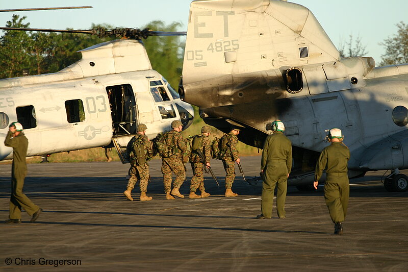 Photo of Marines Boarding a CH-53 Sea Stallion, Clark Air Base, Philippines(7526)