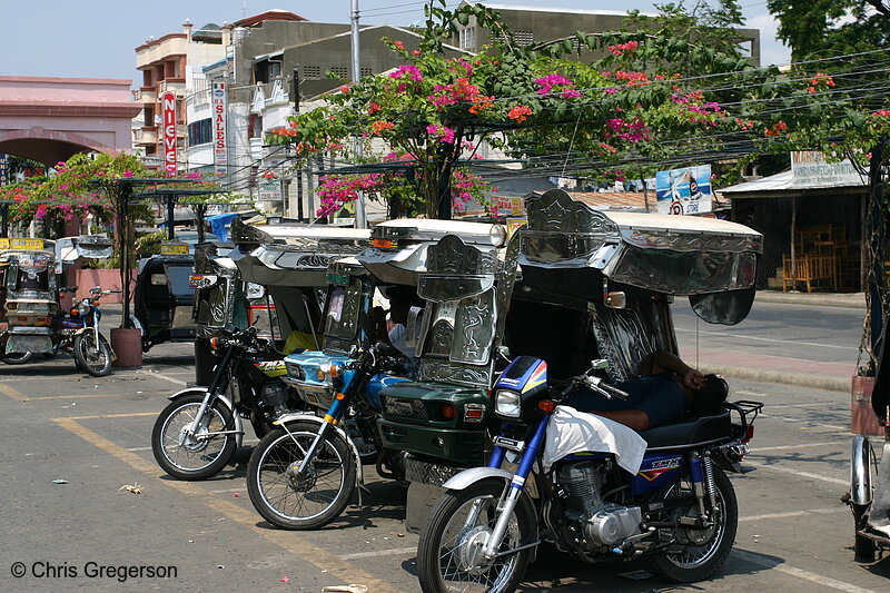 Photo of Trikes outside the Vigan Public Market, Philippines.(8053)