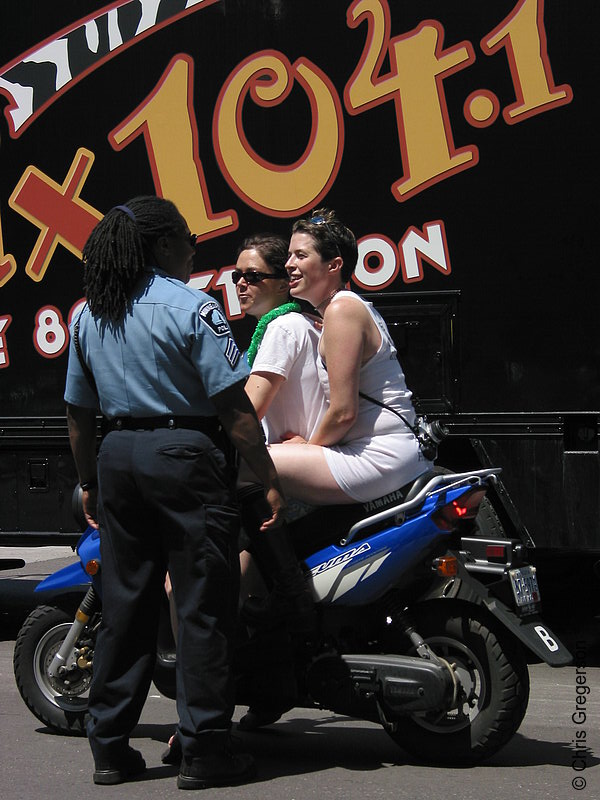 Photo of Police Officer and Women on a Motorcycle(2811)
