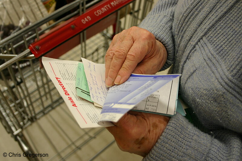 Photo of Woman's Hands and Grocery List(3118)