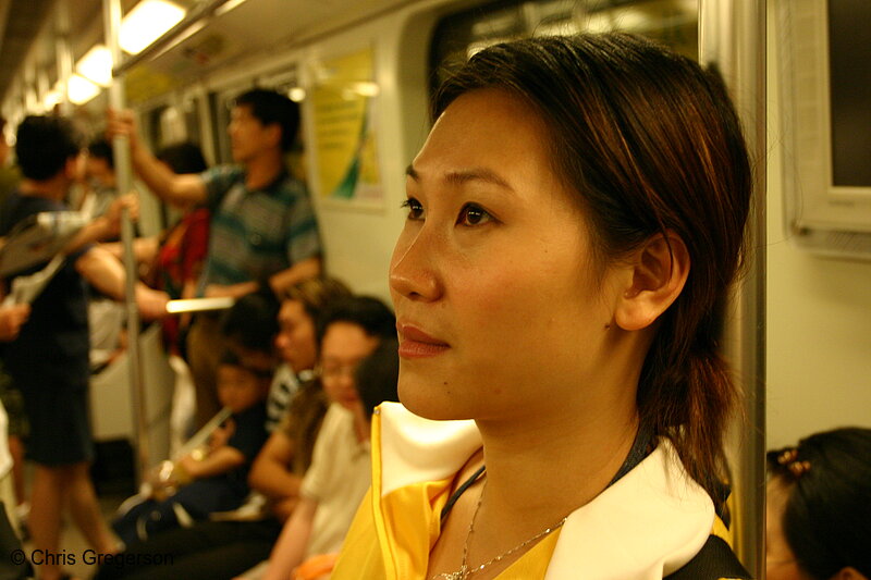 Photo of Woman Standing Riding the Subway(3341)