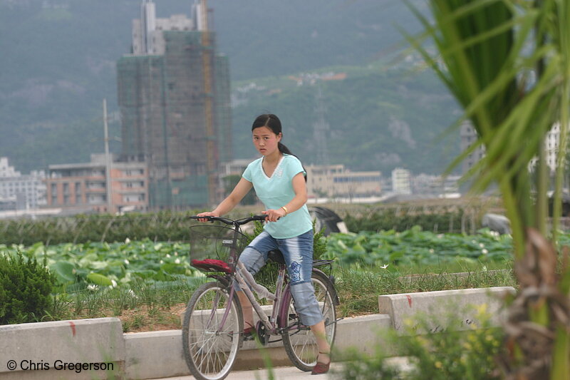 Photo of Young Woman on Bike, Yueqing, China(3446)
