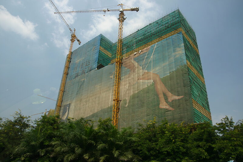 Photo of Chinese Construction with Ad on Scaffolding(4227)