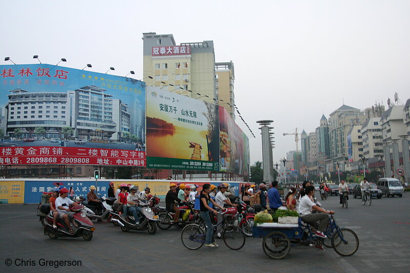 Photo of Billboards and Bicycles, Chinese Intersection(4246)