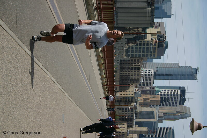 Photo of Runner on Path Over the Stone Arch Bridge(4486)