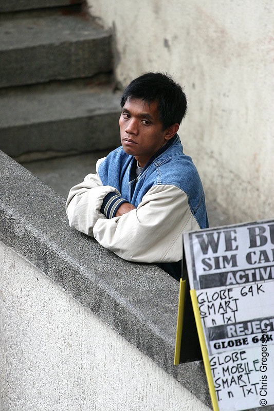 Photo of Man, Buyer of SIM Cards, by an Overpass in Baguio City, Philippines(5733)