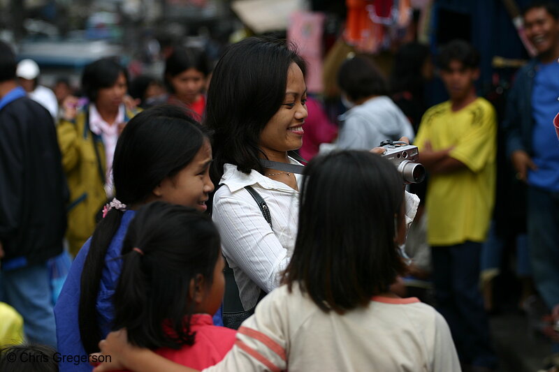 Photo of Arlene with Children in a Crowd at the Baguio Public Market(5767)