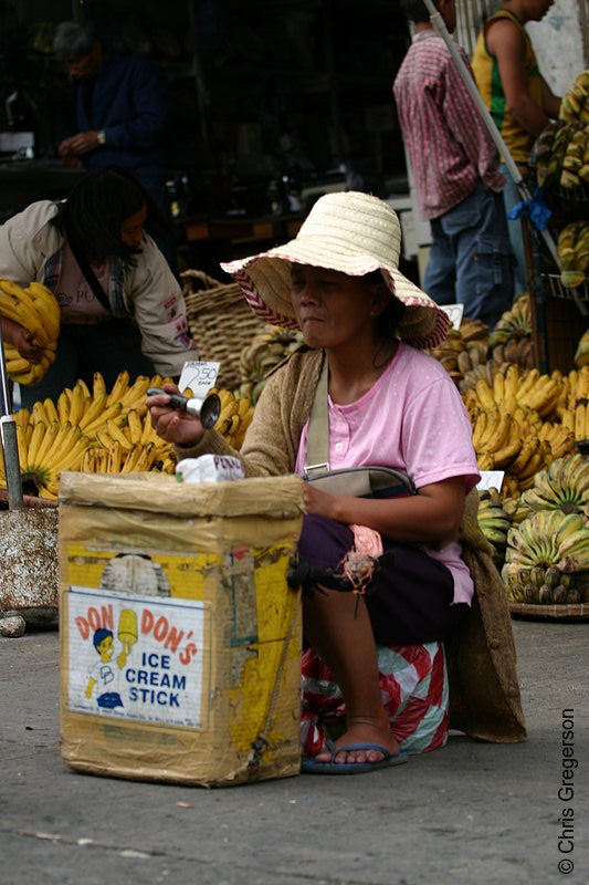 Photo of An Old Woman Selling Ice Cream Sticks in the Baguio Public Market Sidewalk(5769)