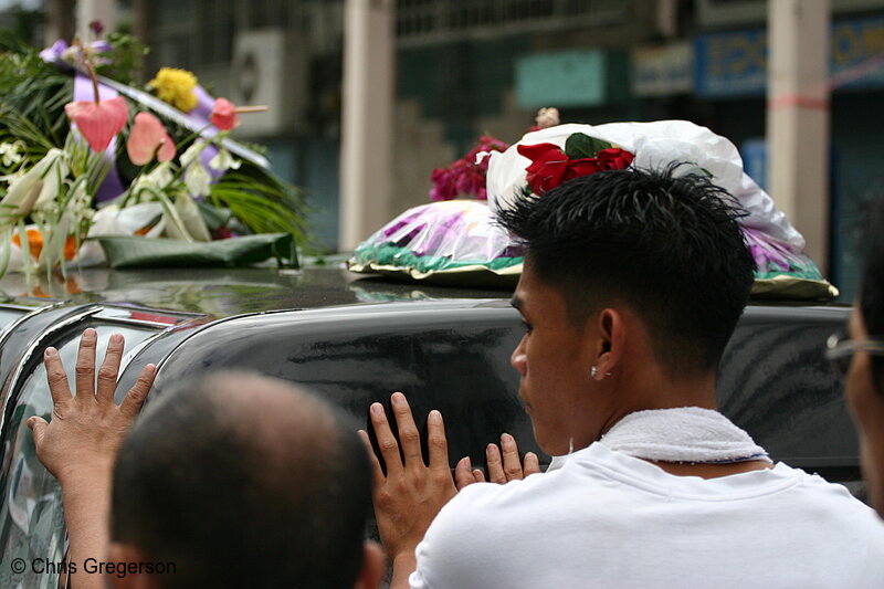 Photo of Filipino Boy's Brother Walking Behind the Hearse(5829)