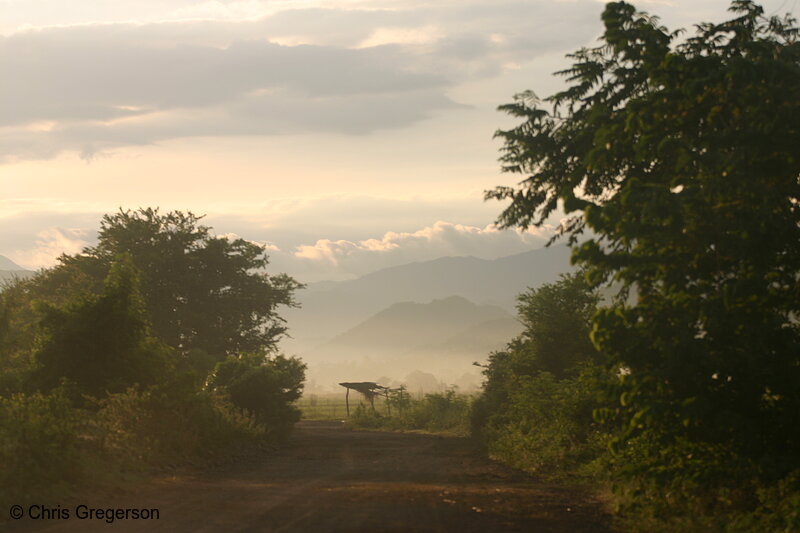 Photo of Sunrise, Clouds, and Mountains on the Road to Barangay Las-Ud, Badoc, Ilocos Norte (Philippines)(6354)