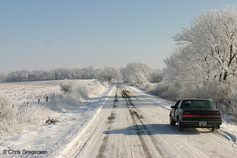 Photo of Car Along Rural Road in Wintertime(6509)