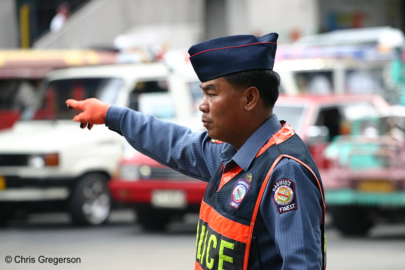 Photo of Police Officer in the Philippines Directing Traffic(6626)