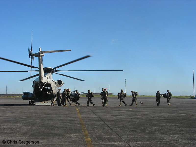 Photo of Marines Boarding a CH-53 Sea Stallion, Clark Air Base, the Philippines(7517)