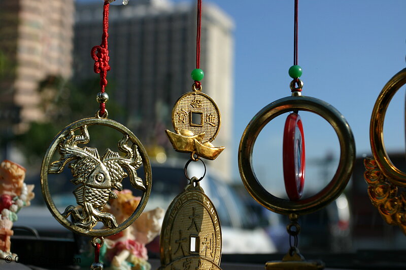 Photo of Medallions Hanging in a Manila Taxi(7805)