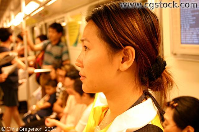 Woman on the Shanghai Subway