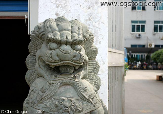 Lion Guarding a Factory Gate