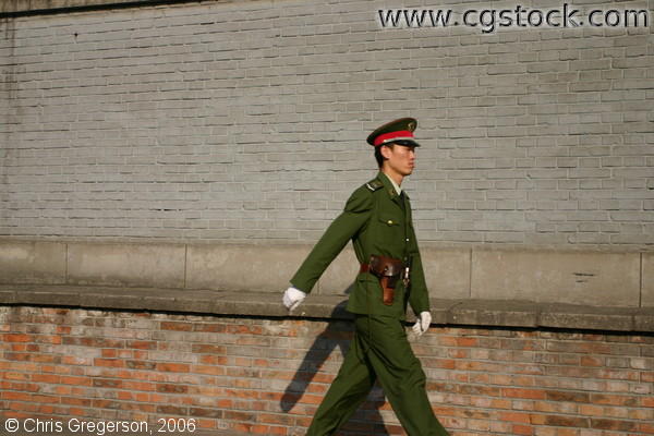 Soldier in Uniform Walking Alone