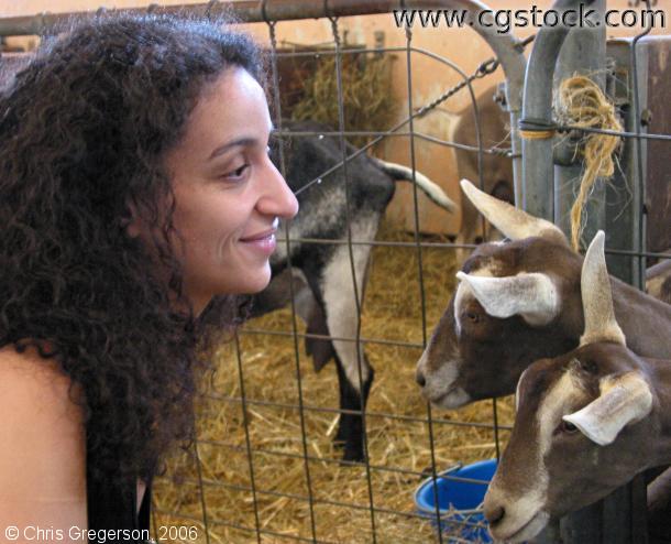 Woman Visiting the Goats
