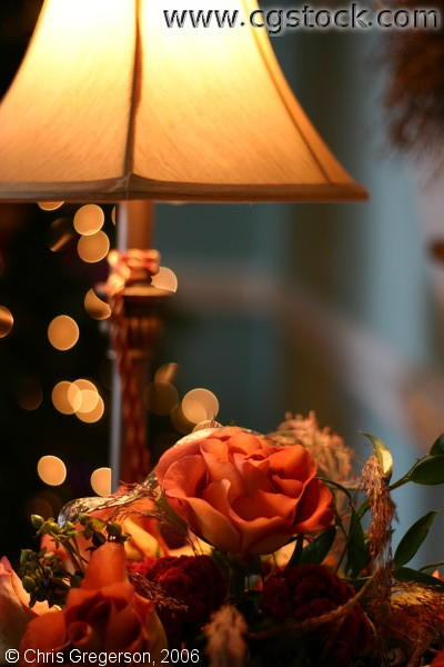 Traditional Table Lamp, Flowers, and Christmas Lights