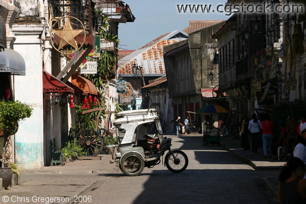 A Tricycle Passes the Street of Vigan, Ilocos Sur, Philippines