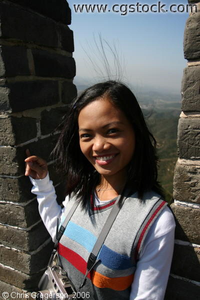 Female Tourist Posing on the Great Wall of China