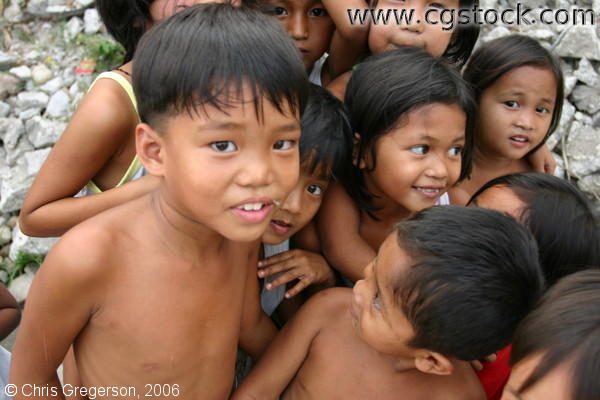 Filipino kids huddling in Angeles City, Pampanga