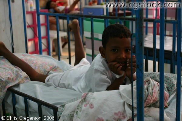 Young Filipino Boy Posing on His Bed in the Pediatric Ward