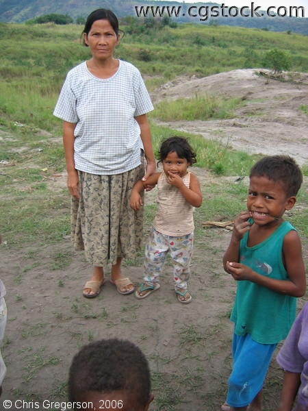 Woman Posing with Granddaughter and Kids from Aeta Settlement Village