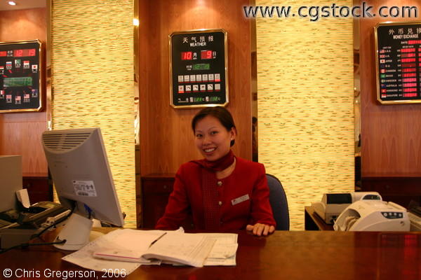 Clerk at the Red Wall Hotel in Beijing