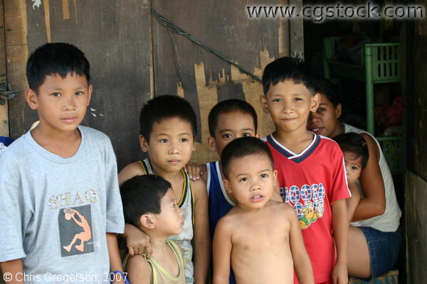 Filipino Children in a Vulcanizing Shop in Bacoor, Cavite
