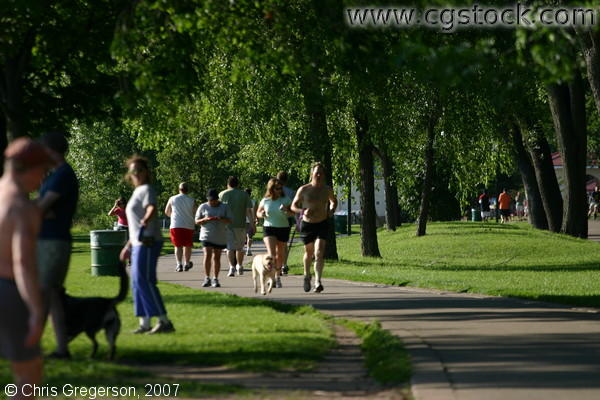 People Jogging on the Path Around Lake Calhoun