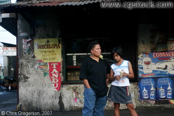 Filipinos Waiting by the Sari Sari Store