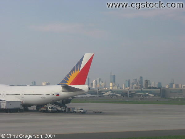 Philippine Airlines Jet and Makati Skyline, Manila