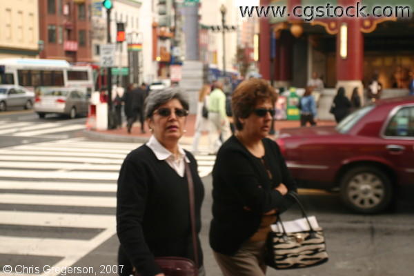 Two Female Pedestrians Walking in Washington, D.C.'s Chinatown