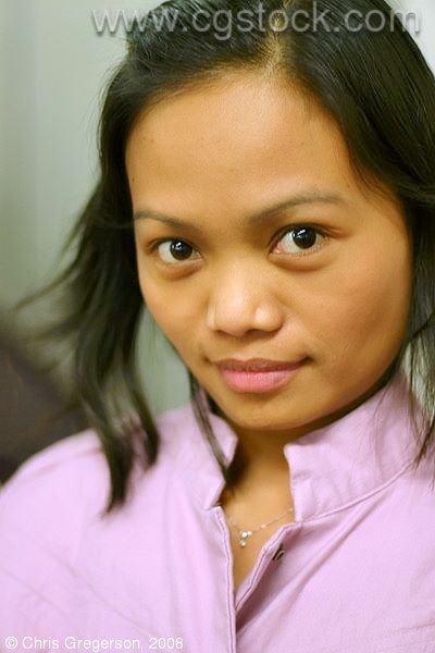 Young Asian Woman with a Serious Expression